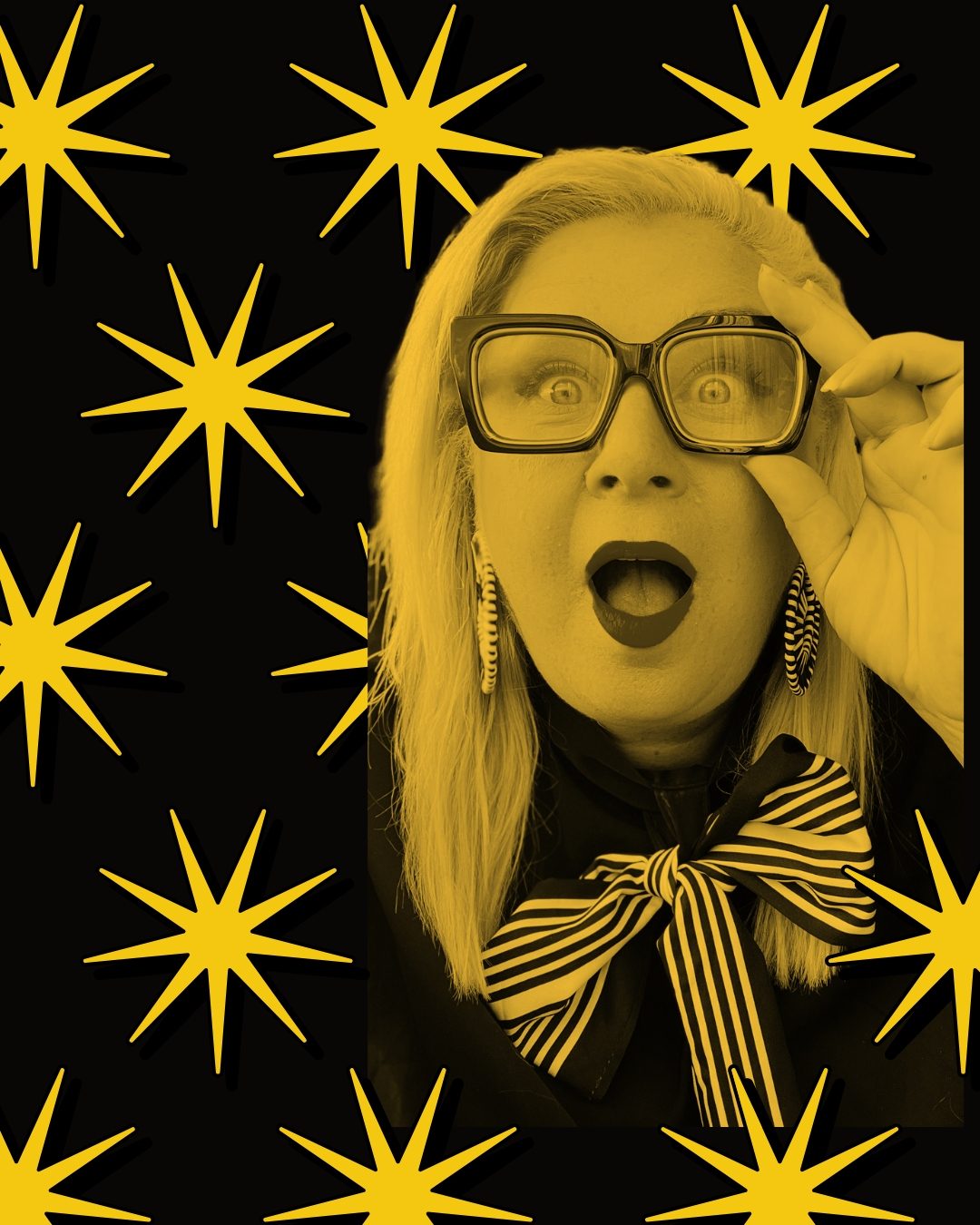 Unison peering over her glasses with a surprised face, gold starbursts behind her